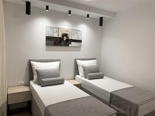 Postel nebo postele na pokoji v ubytování Villa Fani - Apartments in Trogir