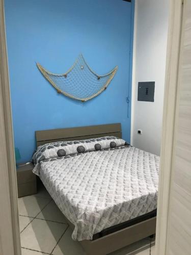 Ένα ή περισσότερα κρεβάτια σε δωμάτιο στο Salinis Apartments