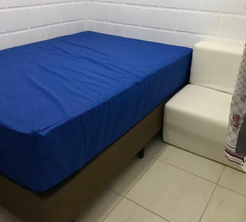 Ένα ή περισσότερα κρεβάτια σε δωμάτιο στο Apartamento Maranduba Ville II