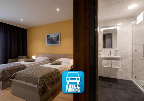 Una cama o camas en una habitación de Hotel Florjančkov Hram