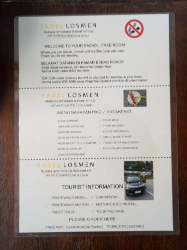 Un certificado, premio, letrero u otro documento en Losmen Fadel Malioboro Jogja