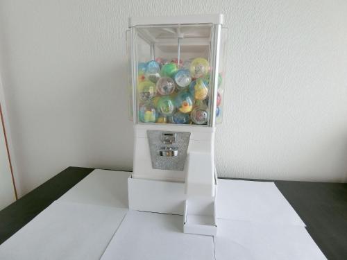 a white refrigerator filled with lots of balls at Yurakuan Miyazaki in Miyazaki