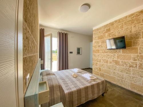 Postel nebo postele na pokoji v ubytování Residenza Case Arse