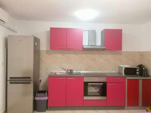 Kuchyň nebo kuchyňský kout v ubytování Apartment Maris