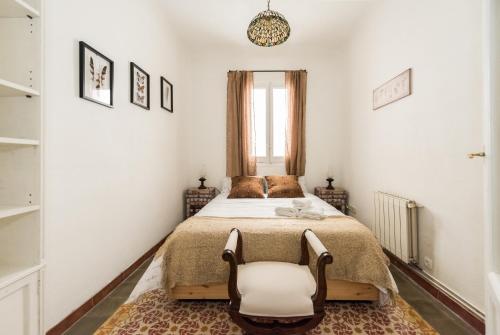 A bed or beds in a room at La Casa de Lope de Rueda