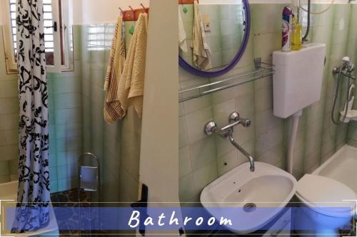 a bathroom with a sink and a mirror at Near the sea vacation home Parja in Vis