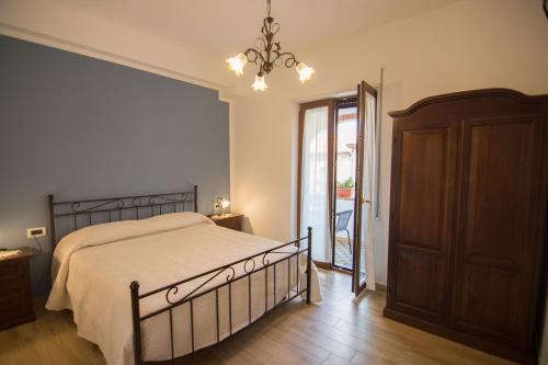 A bed or beds in a room at Relax da Carmen