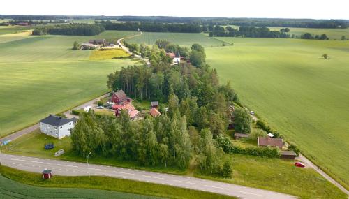 an aerial view of a house and a road at The Cozy Little House in Motala
