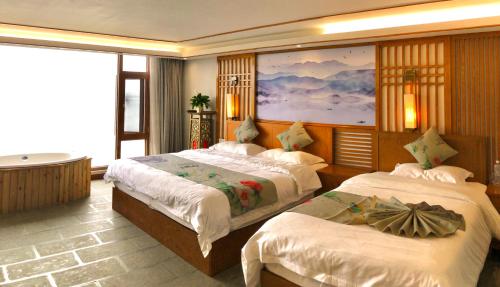 Postel nebo postele na pokoji v ubytování Dali Dare Sea View Gueshouse