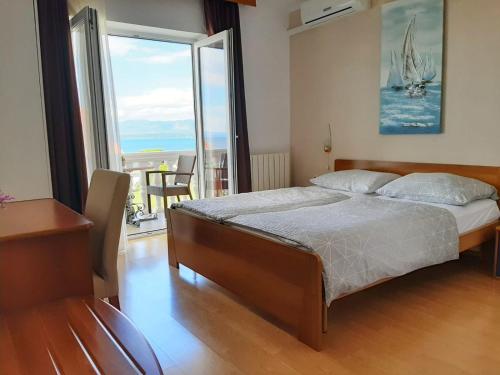 Postel nebo postele na pokoji v ubytování Guest House Katarina