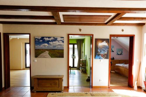 En eller flere senge i et værelse på Silence Ferienwohnungen mit - 2 Apartments