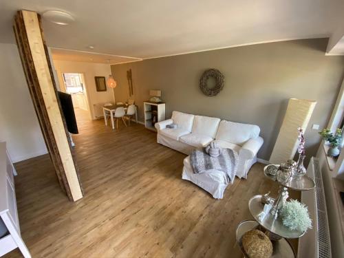 an aerial view of a living room with a white couch at Altstadt Quartier Hameln in Hameln