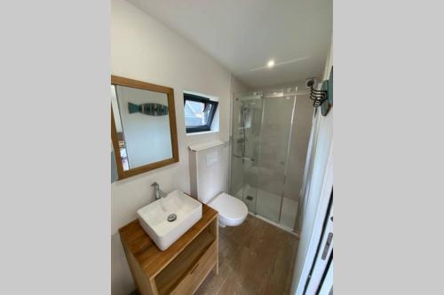 Ένα μπάνιο στο Beach Loft Ar Valum