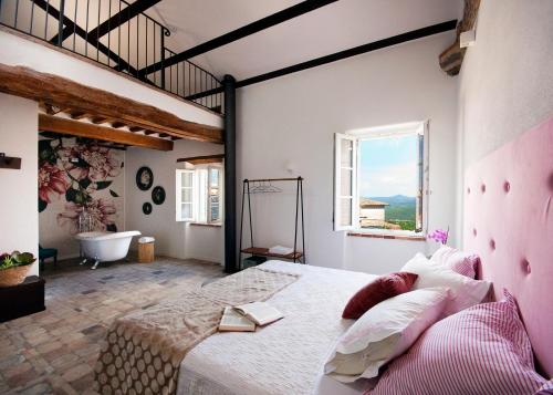 Ένα ή περισσότερα κρεβάτια σε δωμάτιο στο Agriturismo La Via Dell'Oliviera
