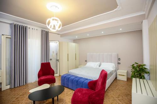 Postel nebo postele na pokoji v ubytování Hotel Vila Stefa