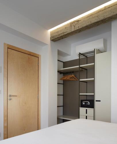 an empty room with a door and a closet at Apartamentos Isaga in Zarautz