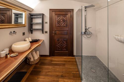 Ванна кімната в Egodomus Charme Apartments - Casa della Gemma