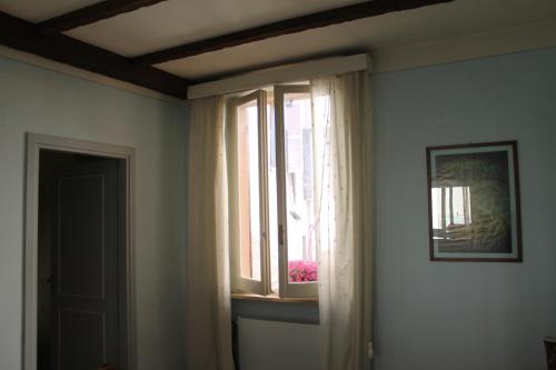 a window in a room with a window sill at Ospitalità Collicola in Spoleto