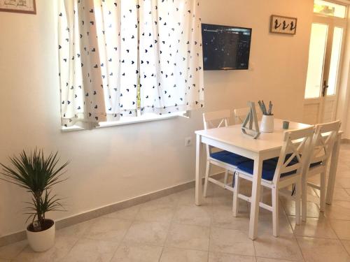 TV a/nebo společenská místnost v ubytování Holiday Home Casa Bianca