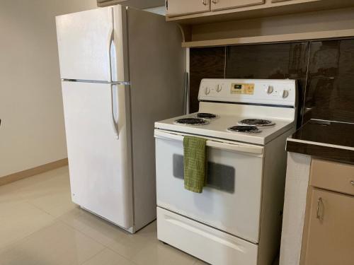Kuchyň nebo kuchyňský kout v ubytování Joes place - 3 Bedroom Apt