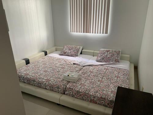 Postel nebo postele na pokoji v ubytování Joes place - 3 Bedroom Apt