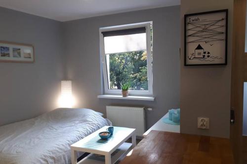 Posteľ alebo postele v izbe v ubytovaní NADMORSKIE Chwile - Apartament