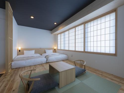 Cama o camas de una habitación en Tosei Hotel Cocone Asakusa Kuramae