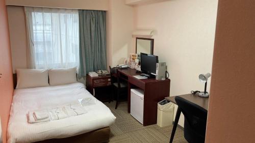Μια τηλεόραση ή/και κέντρο ψυχαγωγίας στο Hotel Green Pacific
