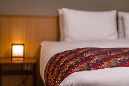 Ένα ή περισσότερα κρεβάτια σε δωμάτιο στο Hotel Sou Kyoto Gion