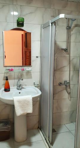 Ένα μπάνιο στο Palmen Apart Hotel