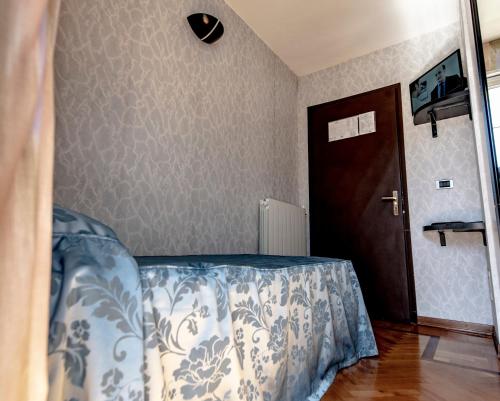 Ένα ή περισσότερα κρεβάτια σε δωμάτιο στο Hotel Pian Nava