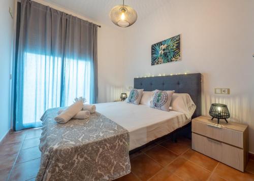 Postel nebo postele na pokoji v ubytování Apartamentos Lloret LUX