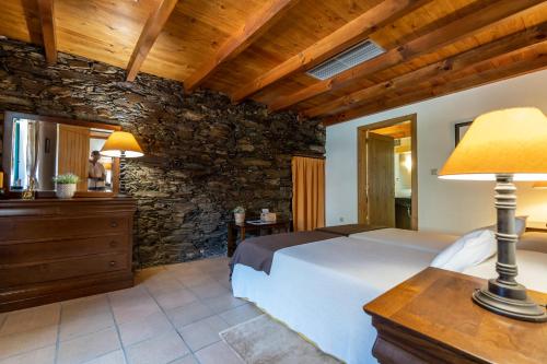 Postel nebo postele na pokoji v ubytování Quinta de S. Jose - Turismo Rural