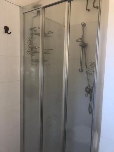 Koupelna v ubytování Torre dei Corsari mit Aussicht auf Meer und Dune