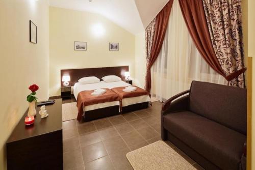 Ένα ή περισσότερα κρεβάτια σε δωμάτιο στο Sleeping hotel
