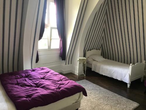 Katil atau katil-katil dalam bilik di Château de Vitry-la-Ville