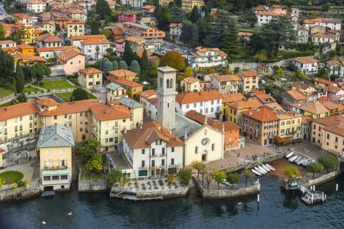 an aerial view of a town by the water at Casa Leonica in Torno