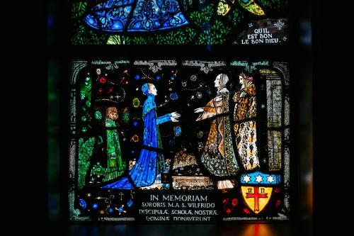 a stained glass window in a church with the words in nemanonymonymous at Stauntons on the Green Hotel in Dublin
