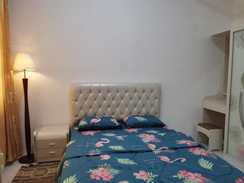Ένα ή περισσότερα κρεβάτια σε δωμάτιο στο CD Seaview Apartment