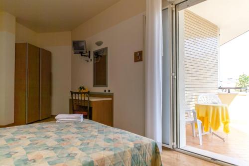 Postel nebo postele na pokoji v ubytování Hotel Diplomatic