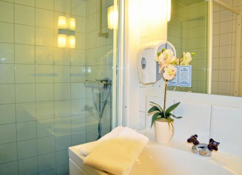 Ett badrum på Hotell Kusten