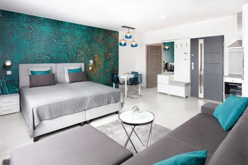 Postel nebo postele na pokoji v ubytování Trend Apartmanház -Vizslás