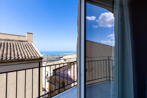 a balcony with a view of the ocean at BnB Sant'Alfonso in Agrigento