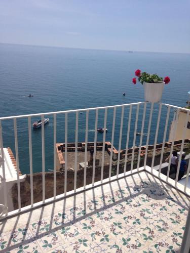 a balcony with a view of the ocean at Maison Raphael Positano in Positano