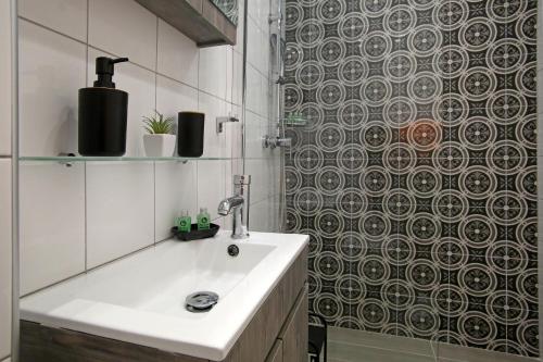 Um banheiro em Under the Aqueduct boutique house