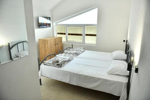 Hostel and Apartments Prilepにあるベッド