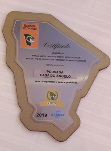 a award plaque for the guatemala casa de amigos at Pousada Casa Do Angelo in Jericoacoara