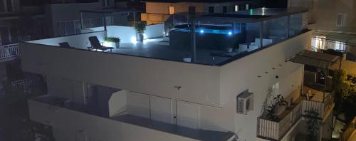 an aerial view of a apartment building with a living room at Casa di Lavanda in Hvar