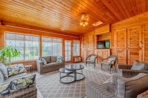 a living room with furniture and a wooden ceiling at Frisco finest home, large, pool, no parties! in Frisco