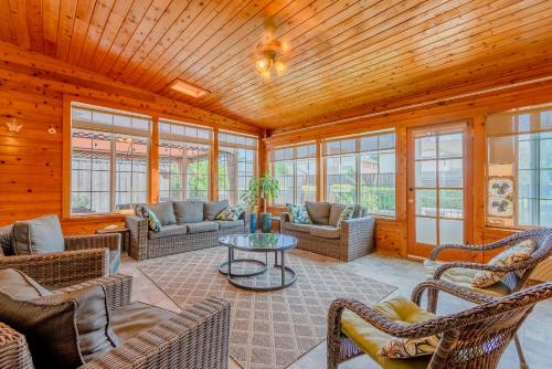 a living room with chairs and a table at Frisco finest home, large, pool, no parties! in Frisco